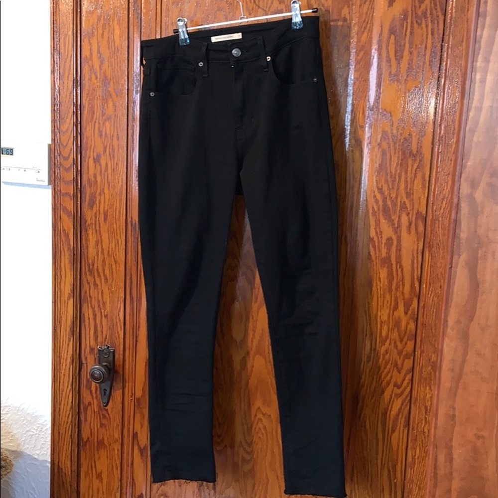 Levi’s black 721 high rise skinny NBW jeans